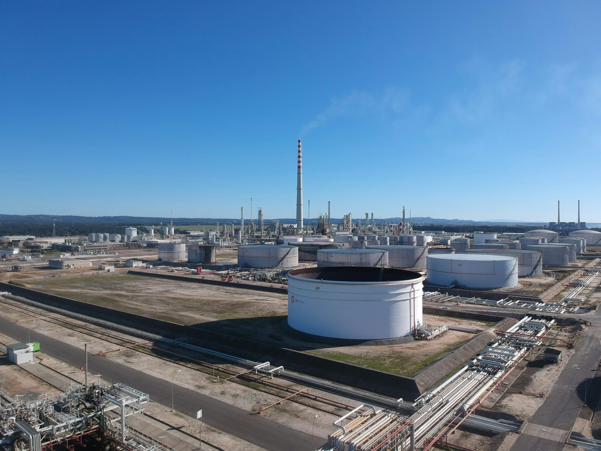 Aerial view of a storage tank inside a secondary containment dike