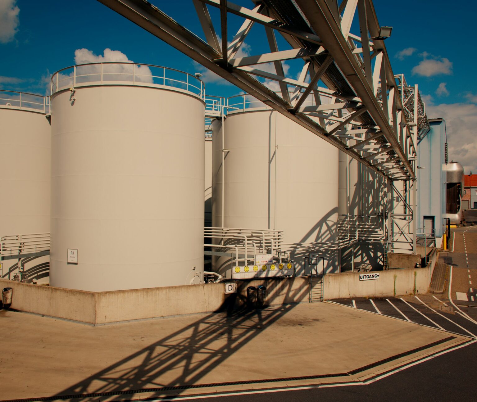 Storage tanks inside a concrete containment area